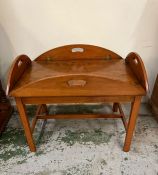 A butlers tray on stand with brass hinges