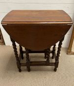 A small barley twist gate leg table