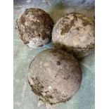 Three garden weathered spheres