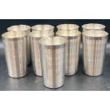 A set of nine solid silver beakers with a star design (Total Approximate Weight is 1305g)