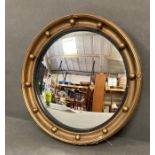 A small circular mirror