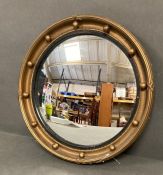 A small circular mirror