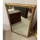 A gilt frame wall mirror with rope effect edging (120cm x 77cm)