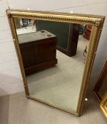 A gilt frame wall mirror with rope effect edging (120cm x 77cm)
