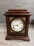 A mahogany bracket clock with brass mounts