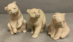 Three Lladro brown bears