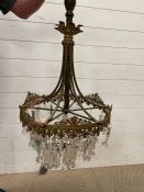 A vintage crystal wreath chandelier