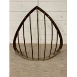 A cast iron hay rack