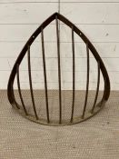 A cast iron hay rack