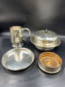 A selection of silver plate to include a wine holder, Harrods lidded dish etc