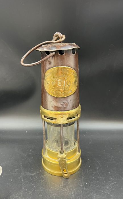 A Miners lamp model No 810 by Thomas and Williams Aberdare