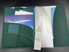 A Concorde flight folder with pen notebook etc.