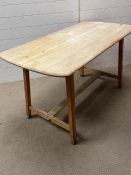 An Ercol CC41 style table. 1960's (H74cm W136cm D68cm)