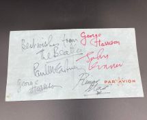 Beatles Autographs: All four of the Beatles autographs on an envelope from the George V hotel in