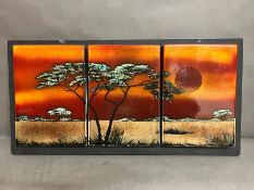 Three glazed tiles mounted, Sunset scene by Poole Pottery (72cm x 36cm)