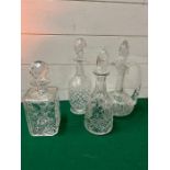 Four cut glass decanters