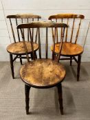 Three Elm Penny chairs, stick back and penny shape seat on turned legs