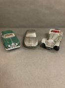 A selection of three Jaguar model cars, Maserati, Maisto, SS100