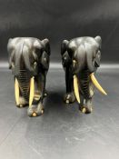 Pair of ebonised elephants