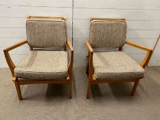 A pair of Mid Century teak lounge chairs or easy chairs 59cm W x 78cm H x 45cm SH