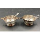 A Pair of silver salts with spoons, hallmarked for London 1910 by Holland, Aldwinckle & Slater (