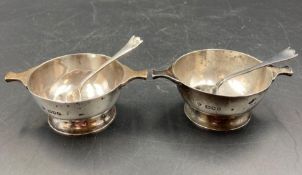 A Pair of silver salts with spoons, hallmarked for London 1910 by Holland, Aldwinckle & Slater (