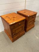 A pair of low pine bedsides (H52cm W40cm D44cm)