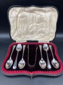 A cased set of six silver teaspoons and sugar nips, hallmarked for Sheffield 1901 by W S Savage & Co