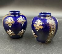 A pair of Fleur De Lis vases (H9cm)