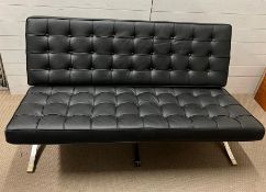 A two seater Barcelona style sofa (H83cm W154cm D72cm)