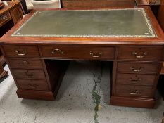 A pedestal desk with leather top, drawers to sides (H83cm W150cm D89cm)