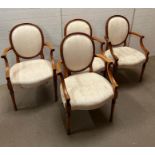 A set of four Louis style dining chairs