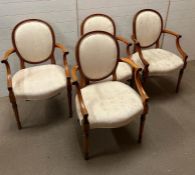 A set of four Louis style dining chairs