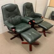 A pair of Lazy boy chairs with stools