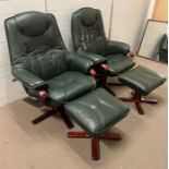 A pair of Lazy boy chairs with stools