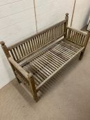 An Edwardian style Heals of London garden bench (H92cm W140cm D55cm)