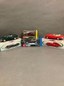 A selection of four boxed Jaguar models