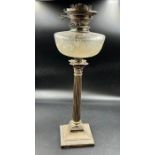 A hallmarked silver Corinthian column candlestick converted to oil lamp (Approximate Height 52cm)