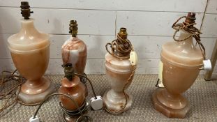 Five onyx lamps various sizes