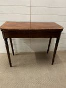 A mahogany card table (H74cm W91cm D45cm)