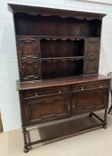 An English oak or Welsh two piece dresser with panelled doors (H200cm W152cm D52cm) (Two parts)