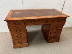 A pedestal desk with leather top (H78cm W125cm D60cm)