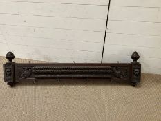 An oak carved coat rack (H36cm W140cm)