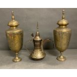 A selection of brass items including two Indian vases and a Middle Eastern tea pot