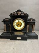 A Victorian black marble mantle clock with ornate brass embellishments C1897 (Working condition