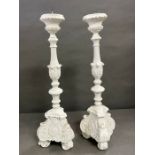 A pair of painted candle sticks with foliage and scrolls (H66cm)