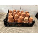 A selection of small terracotta garden pots