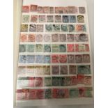 An extensive album of Uk stamps including Penny Reds