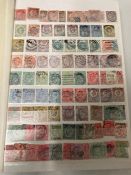 An extensive album of Uk stamps including Penny Reds