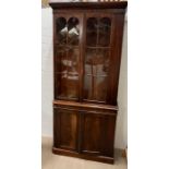 A mahogany glazed bookcase with cupboard under (Base H95cm W110cm D38cm Top H145cm W104cm D33cm)